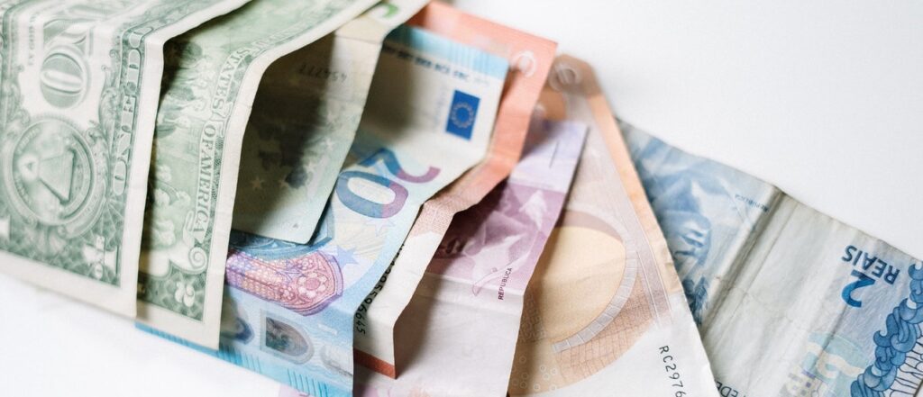 picture of dollars and euros to represent cost cutting ideas for large businesses